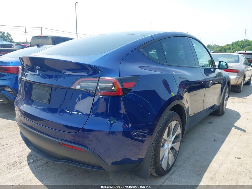 2023 Tesla Model y VIN 7SAYGAEE6PF779816 IAAI salvage auction — HAIL, Salvage (Ohio), sold $8,800 on 2026-08-25 (photo 4)