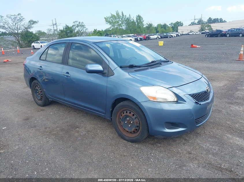 2012 Toyota Yaris VIN JTDBT4K31CL010585 IAAI salvage auction — SIDE, Salvage Title, sold $125 on 2026-07-21 (photo 1)
