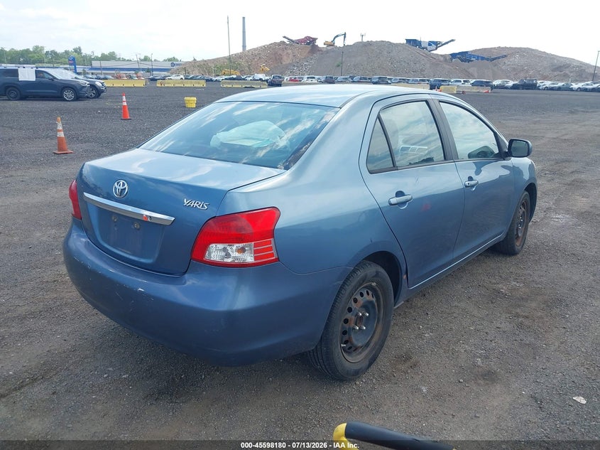 2012 Toyota Yaris VIN JTDBT4K31CL010585 IAAI salvage auction — SIDE, Salvage Title, sold $125 on 2026-07-21 (photo 4)