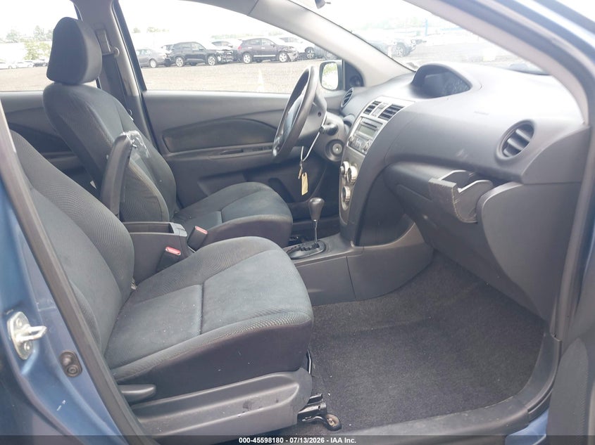 2012 Toyota Yaris VIN JTDBT4K31CL010585 IAAI salvage auction — SIDE, Salvage Title, sold $125 on 2026-07-21 (photo 5)