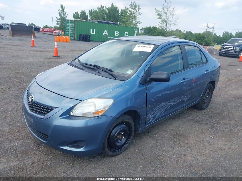 2012 Toyota Yaris VIN JTDBT4K31CL010585 IAAI salvage auction — SIDE, Salvage Title, sold $125 on 2026-07-21 (photo 6)