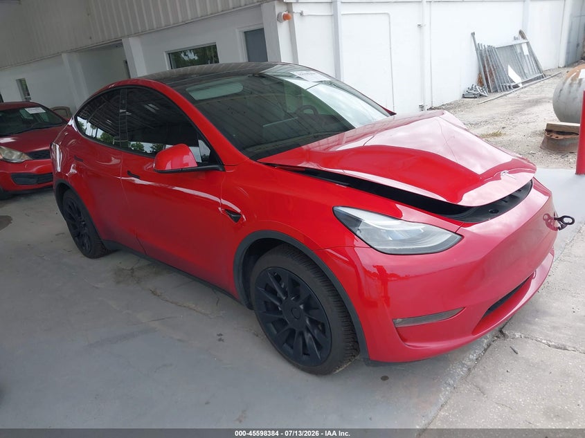 2023 Tesla Model y VIN 7SAYGAEEXPF668153 IAAI salvage auction — LEFT FRONT, Wait Title, sold $9,600 on 2026-08-22 (photo 1)
