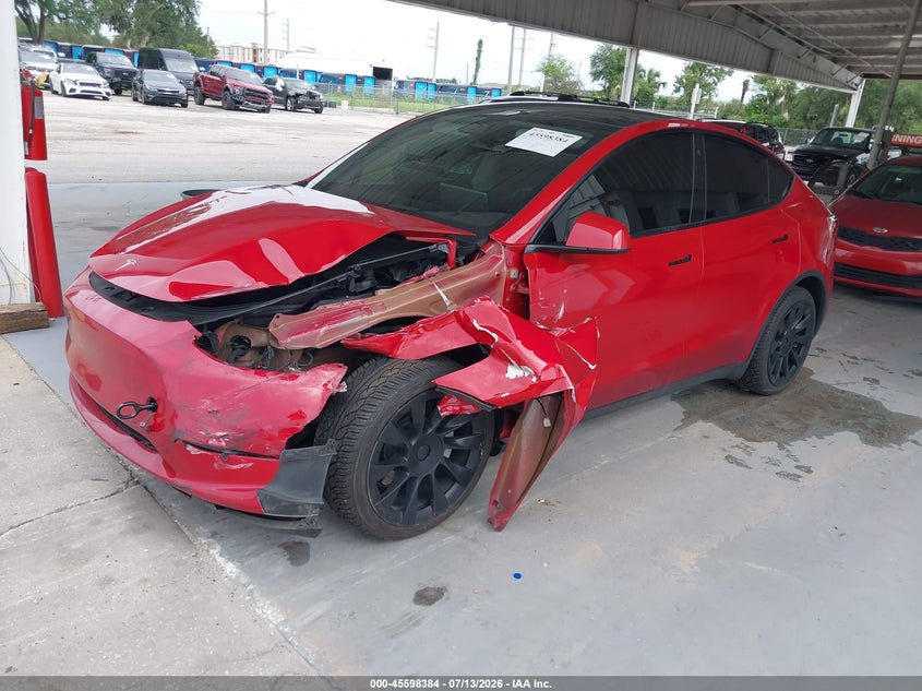 2023 Tesla Model y VIN 7SAYGAEEXPF668153 IAAI salvage auction — LEFT FRONT, Wait Title, sold $9,600 on 2026-08-22 (photo 2)