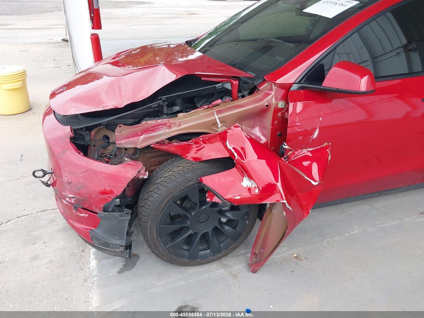 2023 Tesla Model y VIN 7SAYGAEEXPF668153 IAAI salvage auction — LEFT FRONT, Wait Title, sold $9,600 on 2026-08-22 (photo 6)