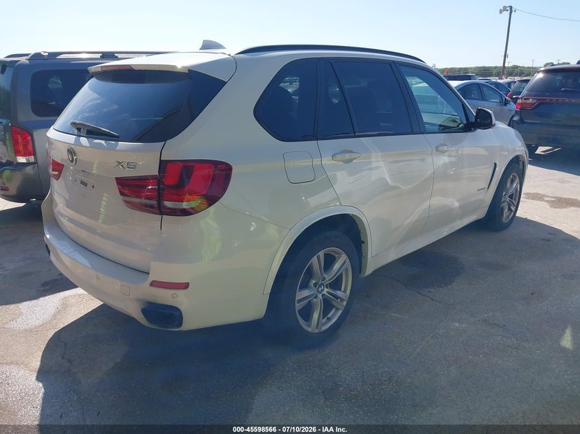 2014 BMW X5 VIN 5UXKR6C59E0J71893 IAAI salvage auction — NORMAL WEAR, Original (Texas), sold $2,350 on 2026-07-29 (photo 4)