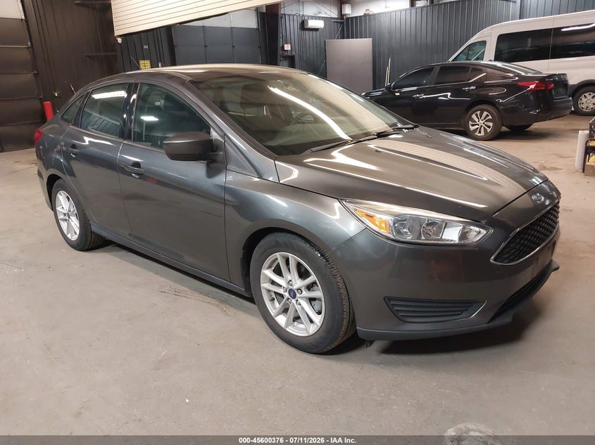 2018 Ford Focus VIN 1FADP3F24JL328230 — IAAI salvage auction photo