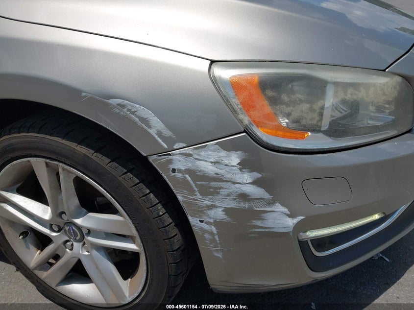 2015 Volvo S60 VIN YV140MFD1F1301439 IAAI salvage auction — NORMAL WEAR, Salvage Title, sold $1,300 on 2026-07-22 (photo 6)