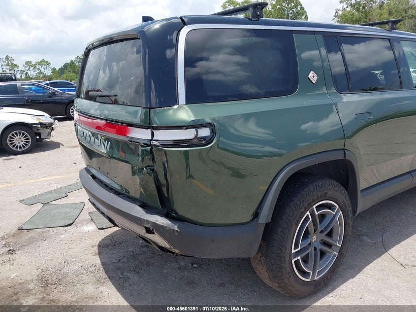 2025 Rivian R1s VIN 7PDSGBBA3SN055515 IAAI salvage auction — REAR END, Wait Title, sold $23,300 on 2026-09-24 (photo 6)