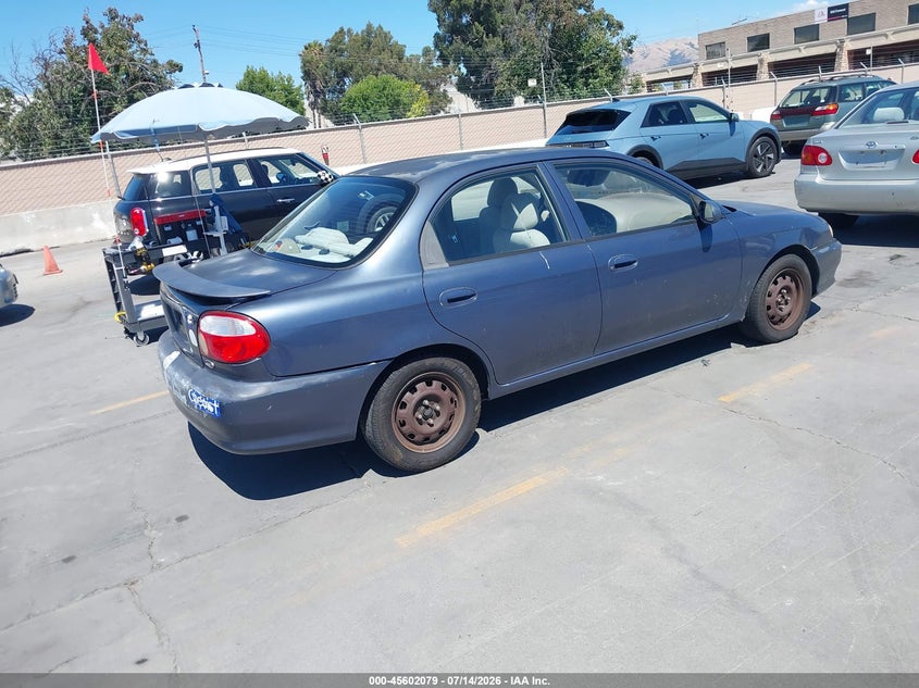 2001 Kia Sephia VIN KNAFB121X15080974 IAAI salvage auction — NORMAL WEAR, Clear - Dealer Only (California), sold $200 on 2026-07-20 (photo 4)