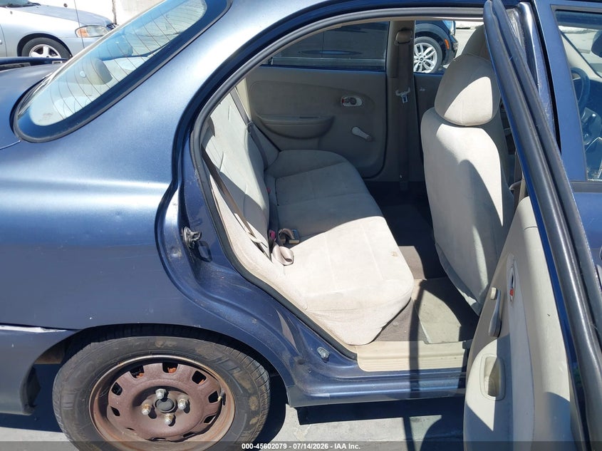 2001 Kia Sephia VIN KNAFB121X15080974 IAAI salvage auction — NORMAL WEAR, Clear - Dealer Only (California), sold $200 on 2026-07-20 (photo 8)