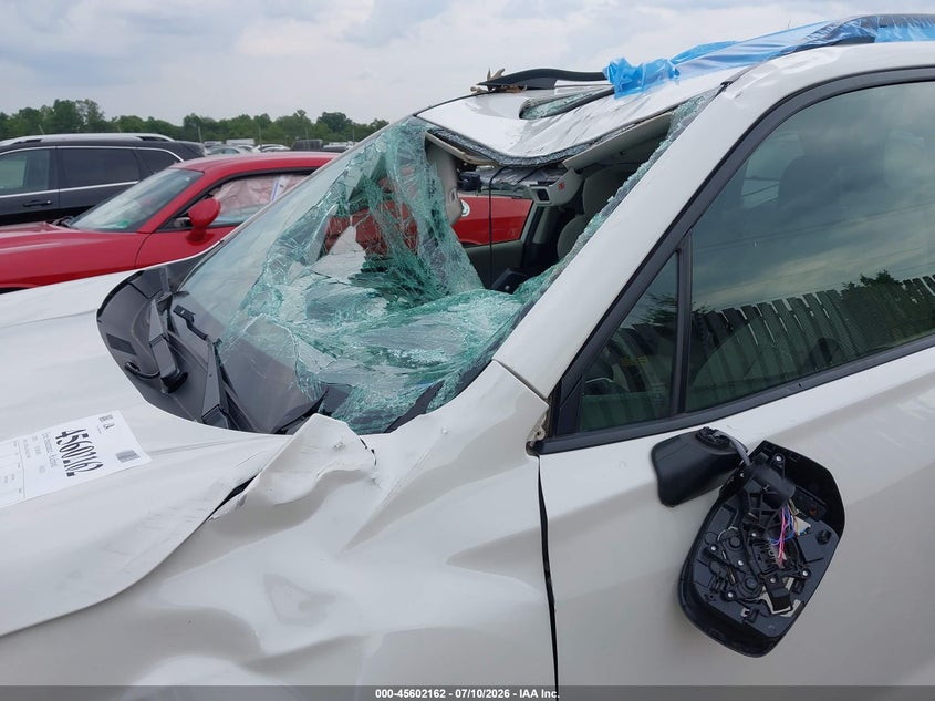 2020 Subaru Forester VIN JF2SKAJC4LH521800 IAAI salvage auction — STORM DAMAGE, Salvage Title, sold $2,600 on 2026-07-30 (photo 6)