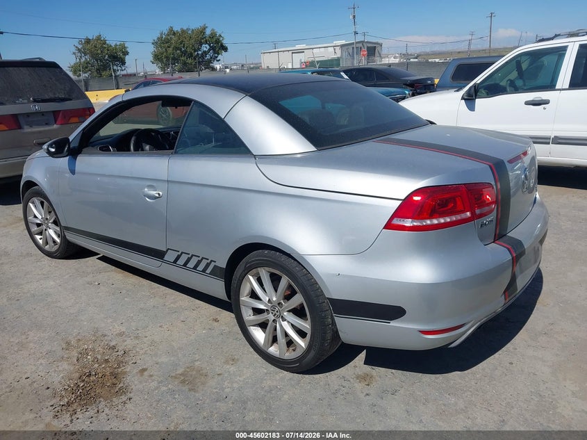 2014 Volkswagen Eos VIN WVWBW8AH9EV006397 IAAI salvage auction — NORMAL WEAR, Salvage Title, sold $125 on 2026-07-30 (photo 3)