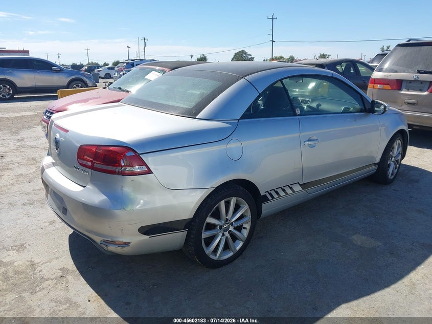 2014 Volkswagen Eos VIN WVWBW8AH9EV006397 IAAI salvage auction — NORMAL WEAR, Salvage Title, sold $125 on 2026-07-30 (photo 4)