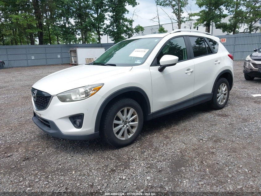 2014 Mazda Cx-5 VIN JM3KE4CY3E0371414 IAAI salvage auction — NORMAL WEAR, Salvage Title, sold $2,300 on 2026-07-15 (photo 2)
