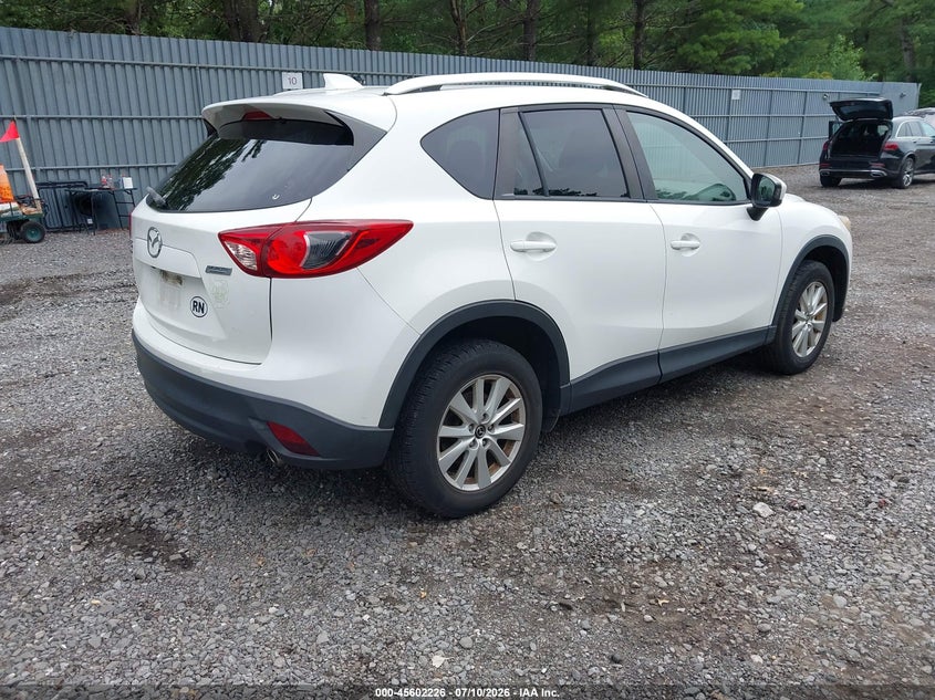 2014 Mazda Cx-5 VIN JM3KE4CY3E0371414 IAAI salvage auction — NORMAL WEAR, Salvage Title, sold $2,300 on 2026-07-15 (photo 4)