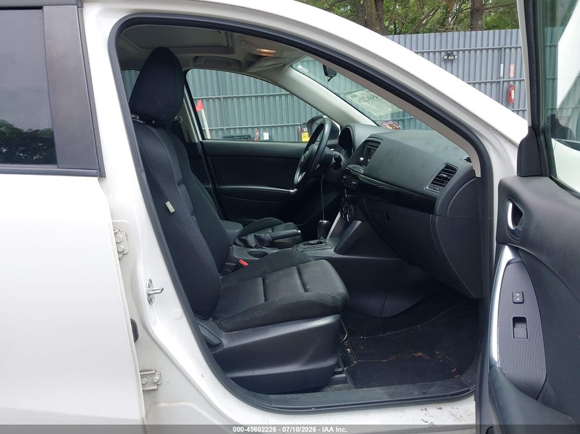 2014 Mazda Cx-5 VIN JM3KE4CY3E0371414 IAAI salvage auction — NORMAL WEAR, Salvage Title, sold $2,300 on 2026-07-15 (photo 5)