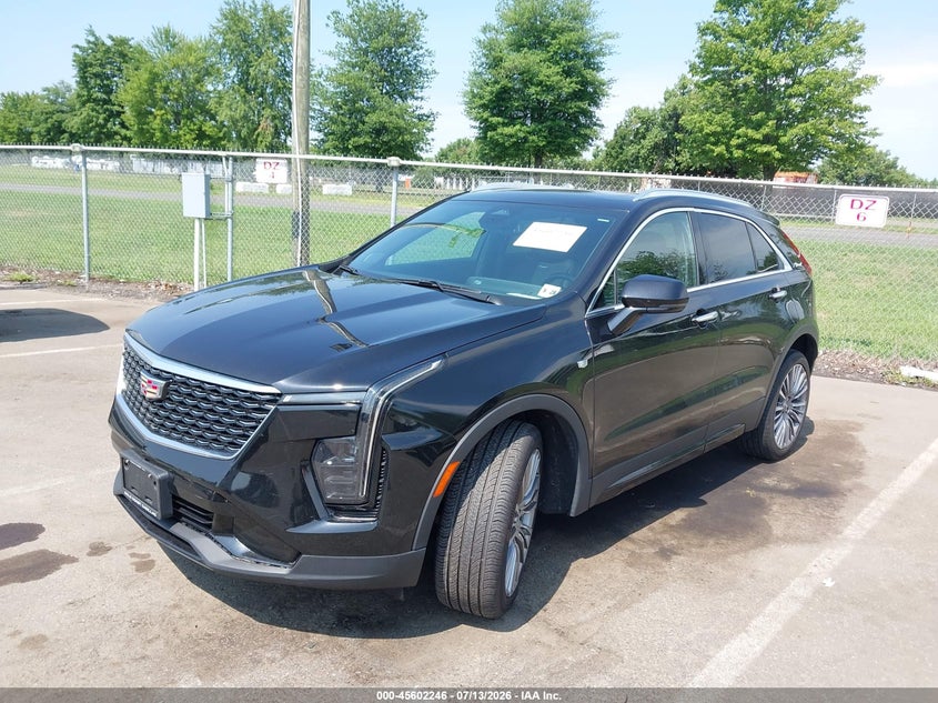 2024 Cadillac Xt4 VIN 1GYFZDR41RF101484 IAAI salvage auction — WATER/FLOOD, Wait Title, sold $14,100 on 2026-09-04 (photo 2)
