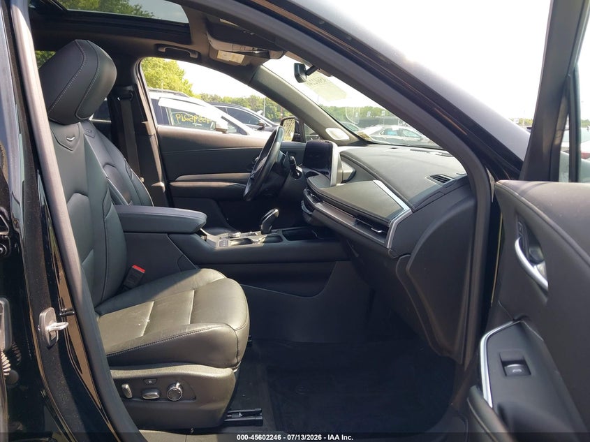 2024 Cadillac Xt4 VIN 1GYFZDR41RF101484 IAAI salvage auction — WATER/FLOOD, Wait Title, sold $14,100 on 2026-09-04 (photo 5)