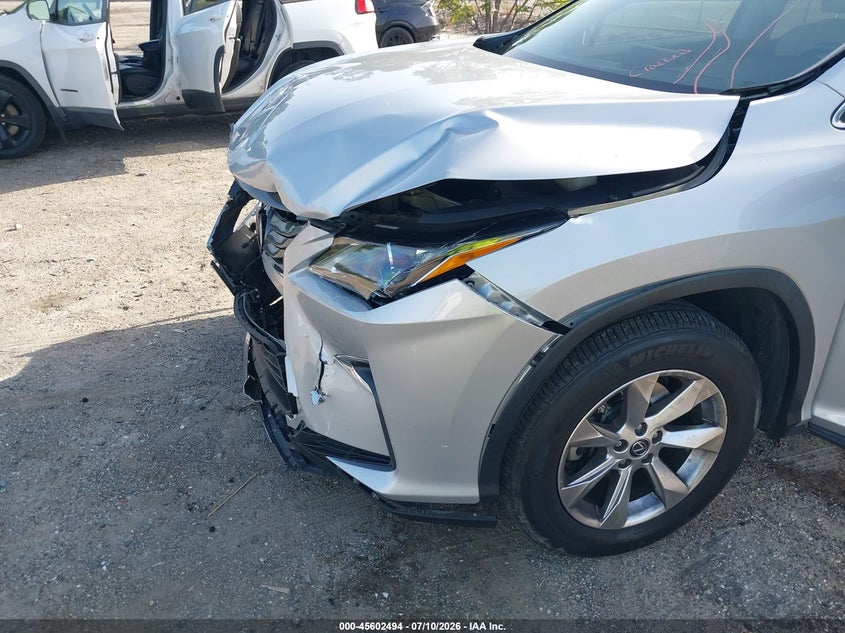 2019 Lexus Rx VIN 2T2ZZMCA0KC125707 IAAI salvage auction — FRONT END, Rebuildable (Florida), sold $11,375 on 2026-08-01 (photo 6)