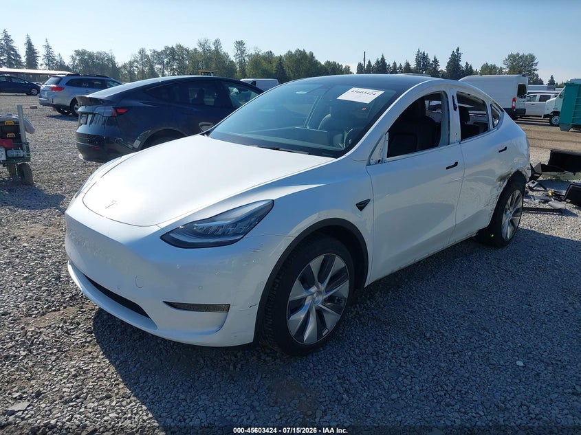 2022 Tesla Model y VIN 7SAYGDEE5NF428622 IAAI salvage auction — LEFT SIDE, Salvage Title, sold $9,500 on 2026-08-03 (photo 2)
