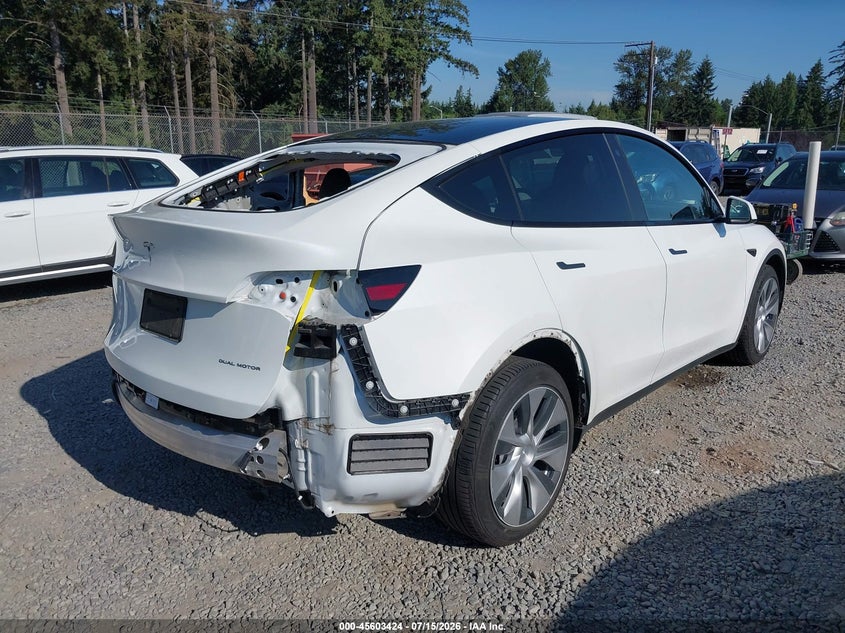 2022 Tesla Model y VIN 7SAYGDEE5NF428622 IAAI salvage auction — LEFT SIDE, Salvage Title, sold $9,500 on 2026-08-03 (photo 4)