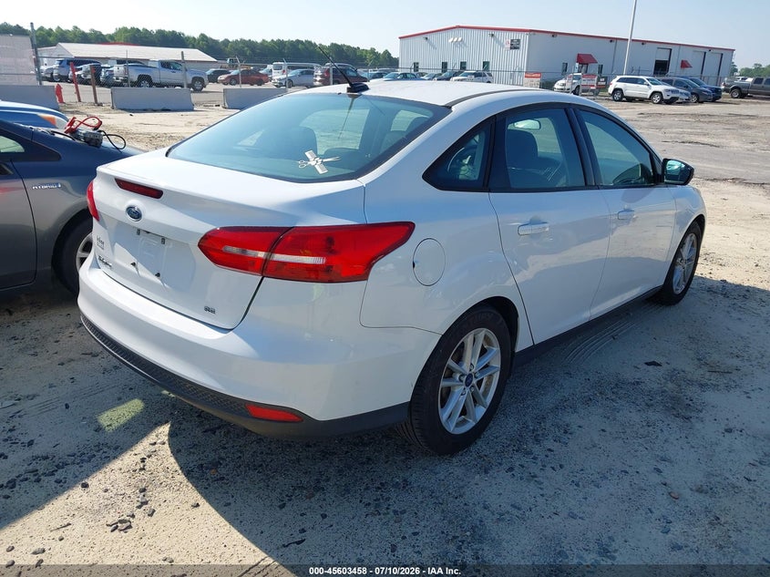 2015 Ford Focus VIN 1FADP3F25FL345903 IAAI salvage auction — NORMAL WEAR, Clear (North Carolina), sold $300 on 2026-07-18 (photo 4)
