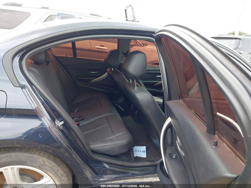 2015 BMW 3er VIN WBA3C3C52FK202166 IAAI salvage auction — NORMAL WEAR, Original (Texas), sold $550 on 2026-07-21 (photo 8)
