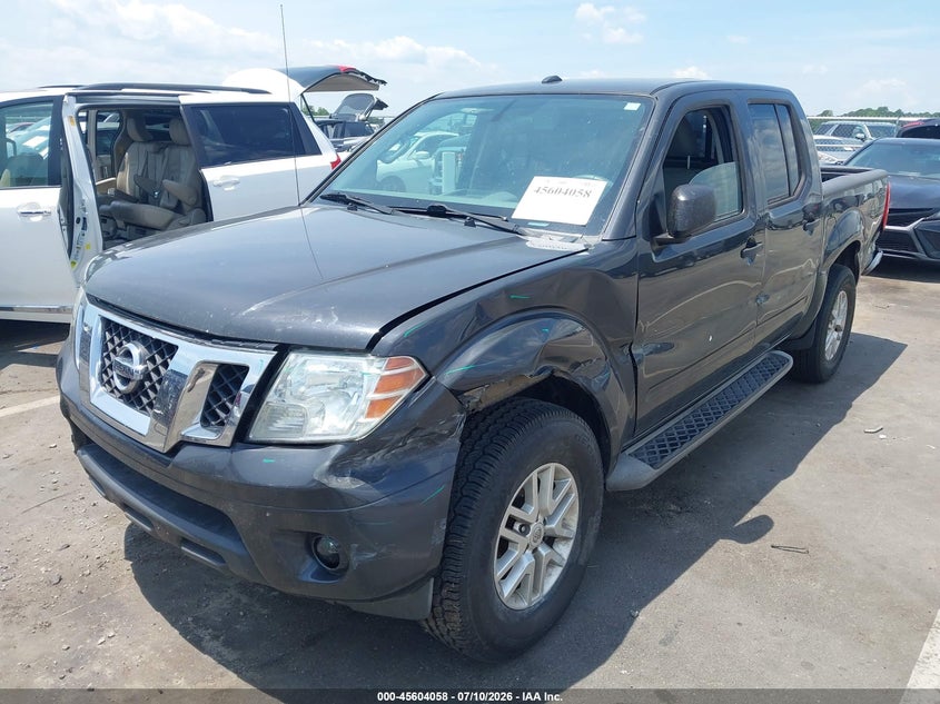 2015 Nissan Navara (frontier) VIN 1N6AD0ER9FN729378 IAAI salvage auction — SIDE, Salvage Title, sold $1,850 on 2026-07-30 (photo 2)