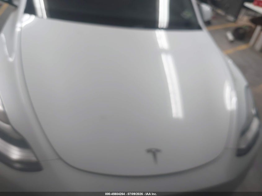 2021 Tesla Model y VIN 5YJYGDED0MF105632 IAAI salvage auction — SUSPENSION, Salvage Title, sold $11,900 on 2026-08-27 (photo 6)