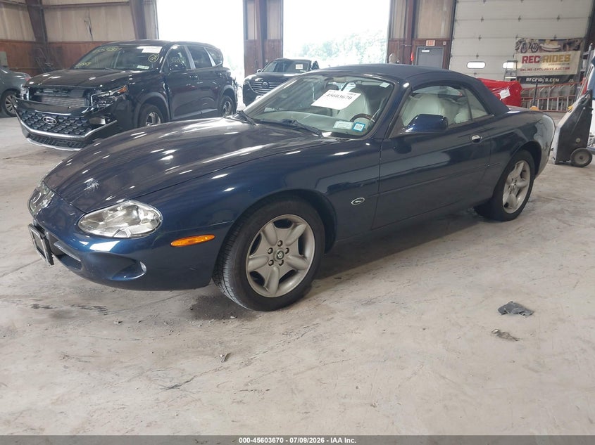 1998 Jaguar Xk series VIN SAJGX2240WC028895 IAAI salvage auction — NORMAL WEAR, Salvage Title (New York), sold $25 on 2026-07-15 (photo 2)