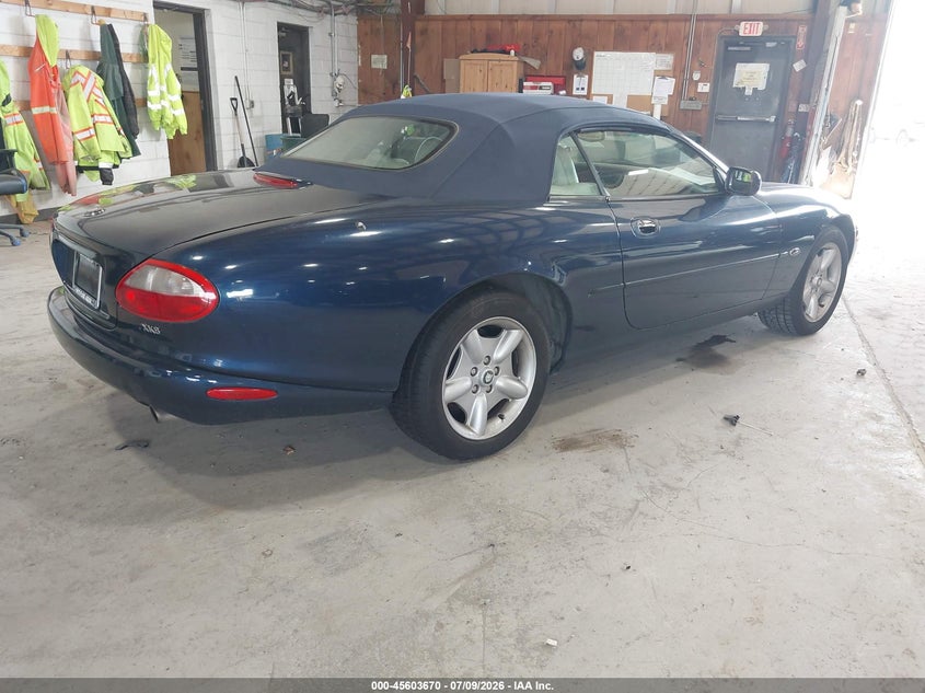 1998 Jaguar Xk series VIN SAJGX2240WC028895 IAAI salvage auction — NORMAL WEAR, Salvage Title (New York), sold $25 on 2026-07-15 (photo 4)