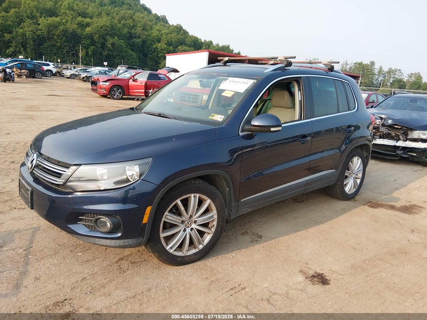 2013 Volkswagen Tiguan VIN WVGBV7AX8DW544159 IAAI salvage auction — NORMAL WEAR, Salvage Title, sold $325 on 2026-07-23 (photo 2)