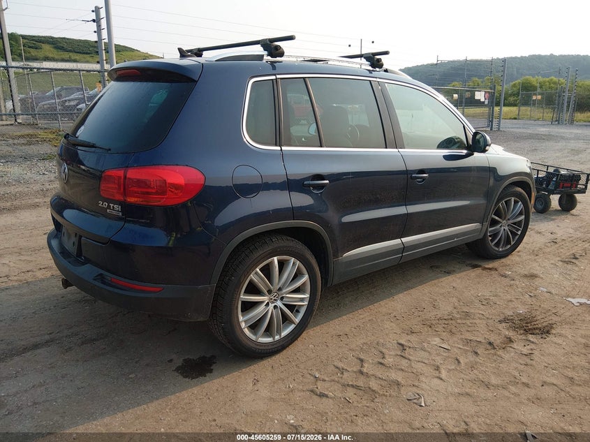 2013 Volkswagen Tiguan VIN WVGBV7AX8DW544159 IAAI salvage auction — NORMAL WEAR, Salvage Title, sold $325 on 2026-07-23 (photo 4)