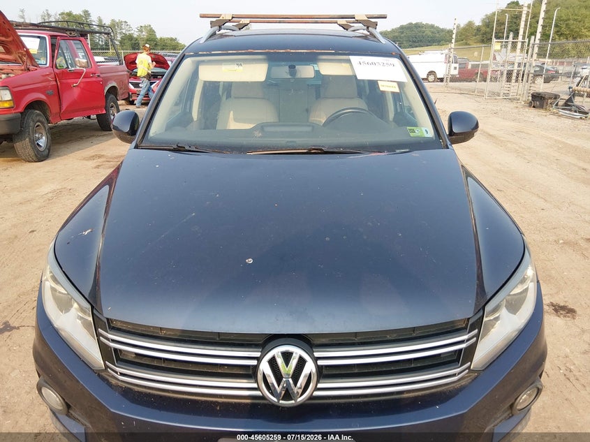 2013 Volkswagen Tiguan VIN WVGBV7AX8DW544159 IAAI salvage auction — NORMAL WEAR, Salvage Title, sold $325 on 2026-07-23 (photo 6)