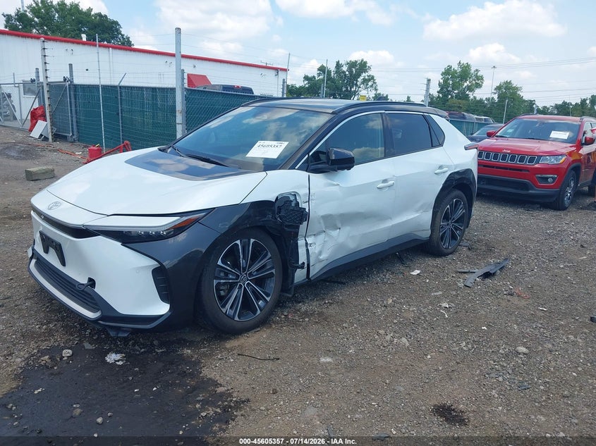 2023 Toyota Bz4x VIN JTMABACA4PA031474 IAAI salvage auction — SIDE, Salvage Title, sold $11,400 on 2026-07-25 (photo 2)