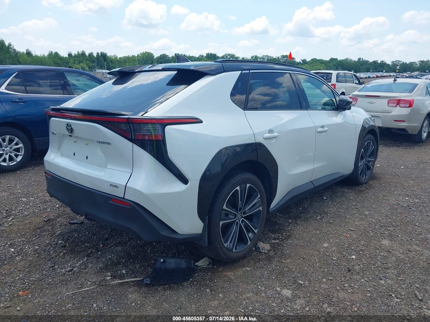 2023 Toyota Bz4x VIN JTMABACA4PA031474 IAAI salvage auction — SIDE, Salvage Title, sold $11,400 on 2026-07-25 (photo 4)