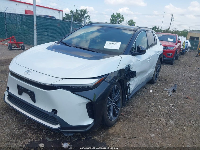 2023 Toyota Bz4x VIN JTMABACA4PA031474 IAAI salvage auction — SIDE, Salvage Title, sold $11,400 on 2026-07-25 (photo 6)