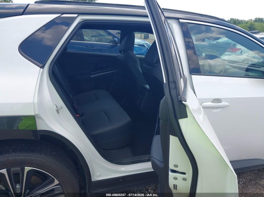 2023 Toyota Bz4x VIN JTMABACA4PA031474 IAAI salvage auction — SIDE, Salvage Title, sold $11,400 on 2026-07-25 (photo 8)
