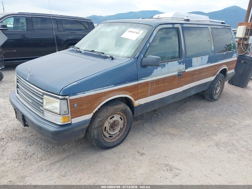 1990 Plymouth Grand voyager VIN 1P4GH54R5LX247972 IAAI salvage auction — NORMAL WEAR, Clear (Montana), sold $50 on 2026-07-22 (photo 2)
