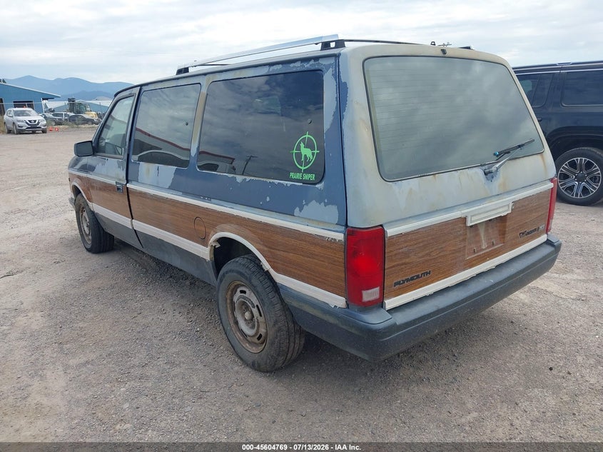 1990 Plymouth Grand voyager VIN 1P4GH54R5LX247972 IAAI salvage auction — NORMAL WEAR, Clear (Montana), sold $50 on 2026-07-22 (photo 3)