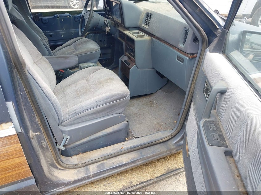 1990 Plymouth Grand voyager VIN 1P4GH54R5LX247972 IAAI salvage auction — NORMAL WEAR, Clear (Montana), sold $50 on 2026-07-22 (photo 5)