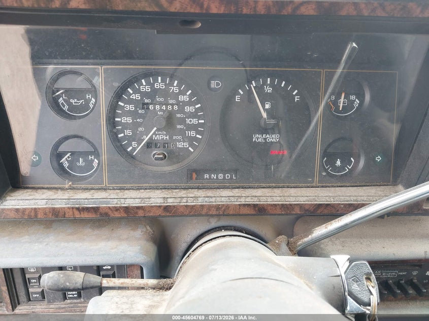 1990 Plymouth Grand voyager VIN 1P4GH54R5LX247972 IAAI salvage auction — NORMAL WEAR, Clear (Montana), sold $50 on 2026-07-22 (photo 7)