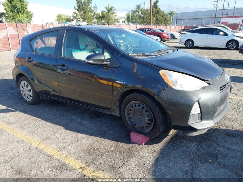 2014 Toyota Prius c VIN JTDKDTB39E1063735 IAAI salvage auction — LEFT SIDE, Salvage (California), sold $225 on 2026-07-28 (photo 1)