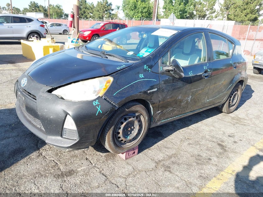 2014 Toyota Prius c VIN JTDKDTB39E1063735 IAAI salvage auction — LEFT SIDE, Salvage (California), sold $225 on 2026-07-28 (photo 2)