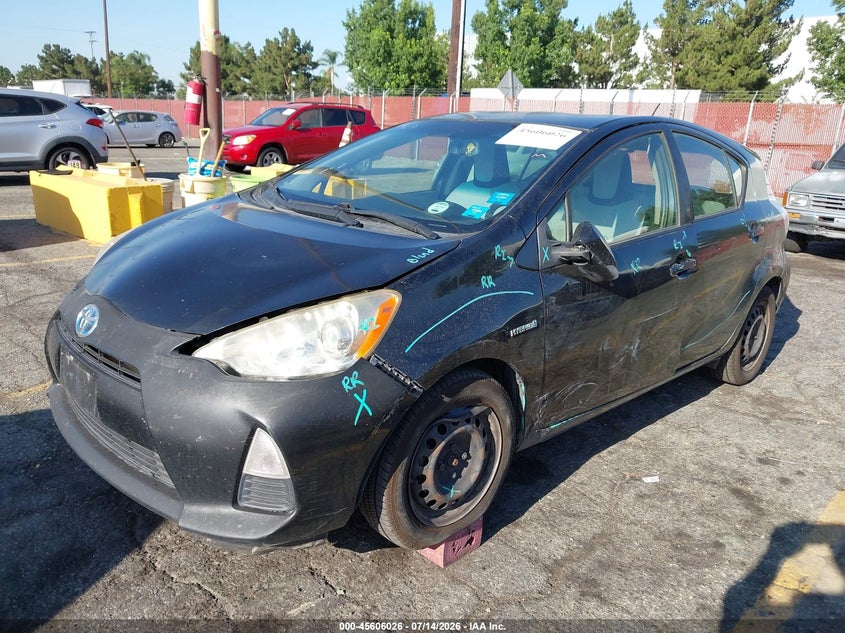 2014 Toyota Prius c VIN JTDKDTB39E1063735 IAAI salvage auction — LEFT SIDE, Salvage (California), sold $225 on 2026-07-28 (photo 6)
