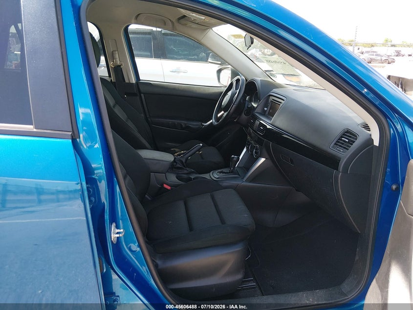 2014 Mazda Cx-5 VIN JM3KE2CYXE0328239 IAAI salvage auction — WATER/FLOOD, Salvage Title, sold $25 on 2026-07-27 (photo 5)