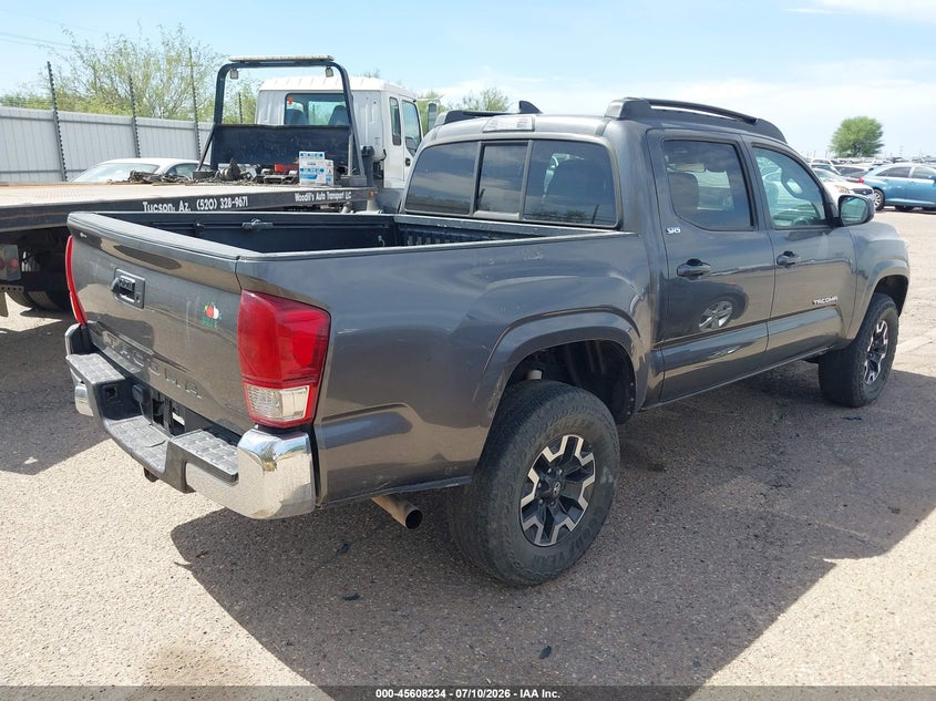 2018 Toyota Tacoma VIN 5TFAX5GN4JX129141 IAAI salvage auction — FRONT & REAR, Clear (Florida), sold $7,100 on 2026-07-30 (photo 4)