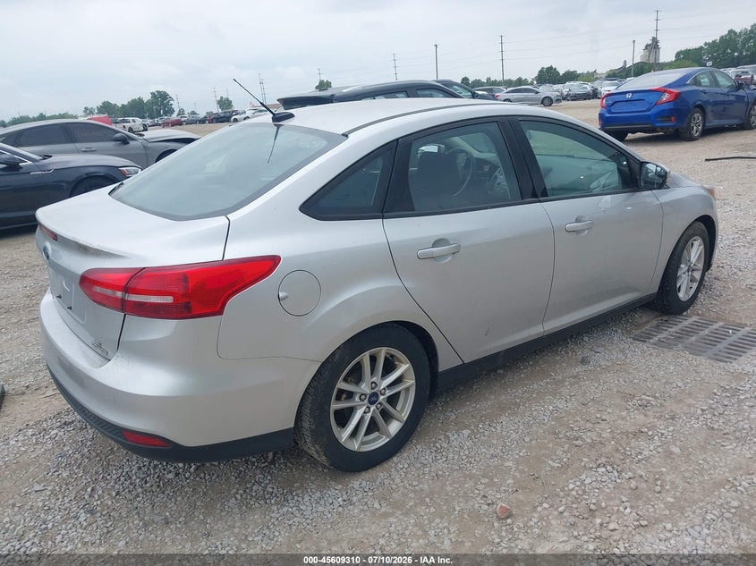 2016 Ford Focus VIN 1FADP3F21GL386594 IAAI salvage auction — NORMAL WEAR, Original (Ohio), sold $900 on 2026-08-01 (photo 4)