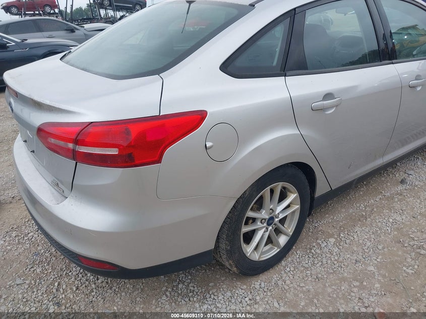2016 Ford Focus VIN 1FADP3F21GL386594 IAAI salvage auction — NORMAL WEAR, Original (Ohio), sold $900 on 2026-08-01 (photo 6)