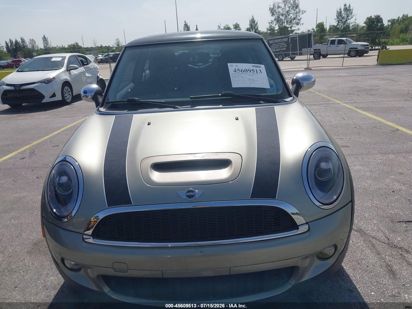 2007 Mini Cooper VIN WMWMF73577TL88981 IAAI salvage auction — NORMAL WEAR, Clear (Florida), sold $375 on 2026-07-30 (photo 6)